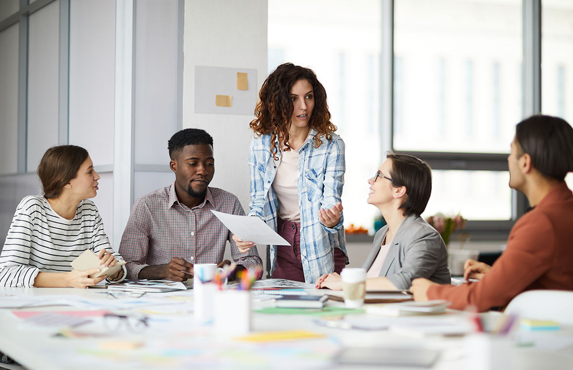 Man smiling in a bright office